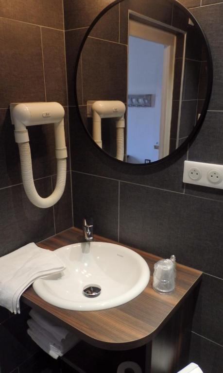Koupelna v ubytování Hôtel Viallet