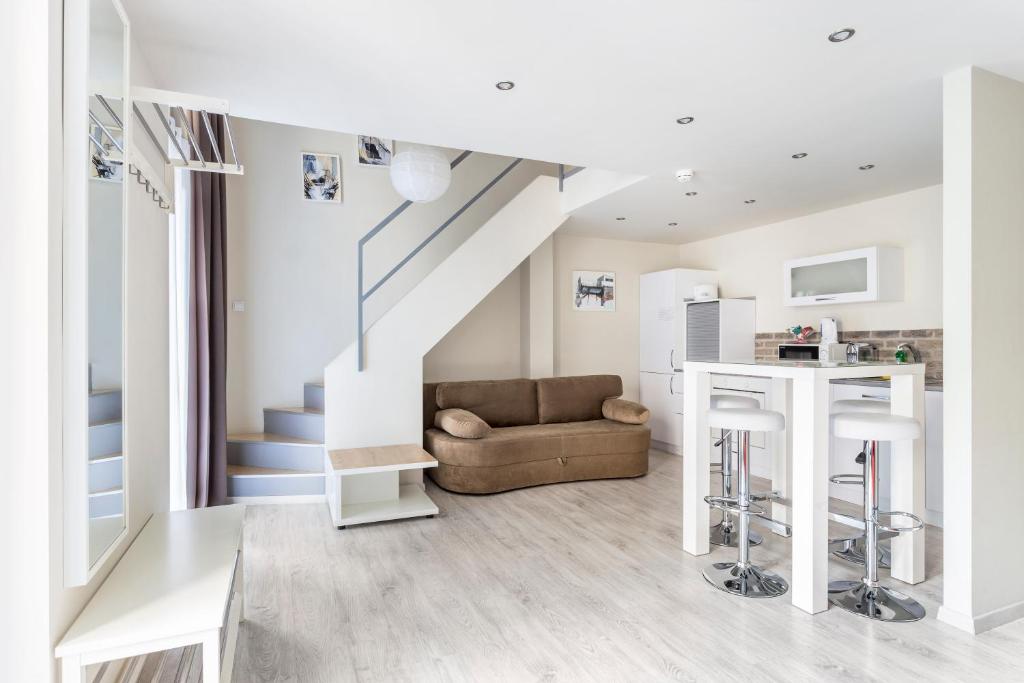 Kuchyň nebo kuchyňský kout v ubytování Hotel Mika Downtown
