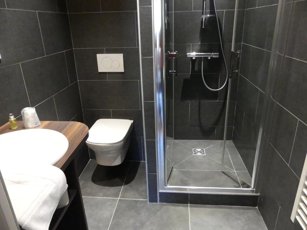 Koupelna v ubytování Hôtel Viallet