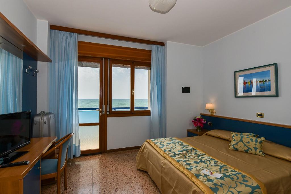 TV a/nebo společenská místnost v ubytování Hotel Souvenir