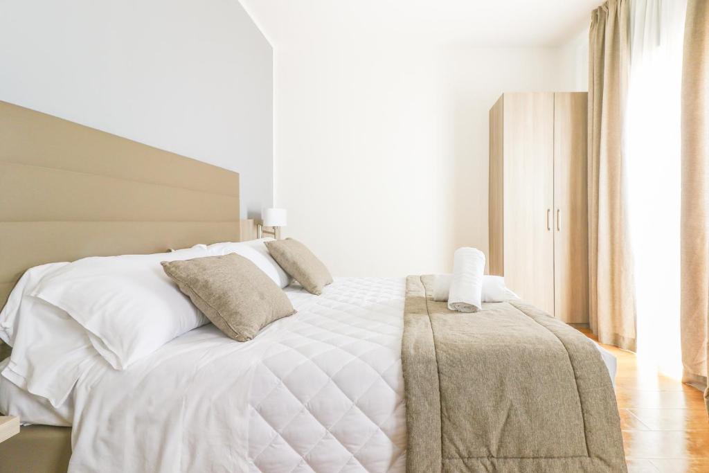 Postel nebo postele na pokoji v ubytování Hotel Loreley