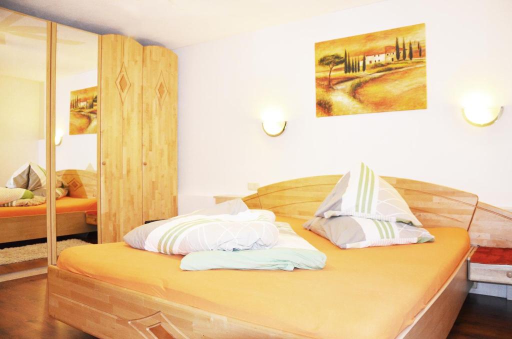 Postel nebo postele na pokoji v ubytování Appartments Enterwald