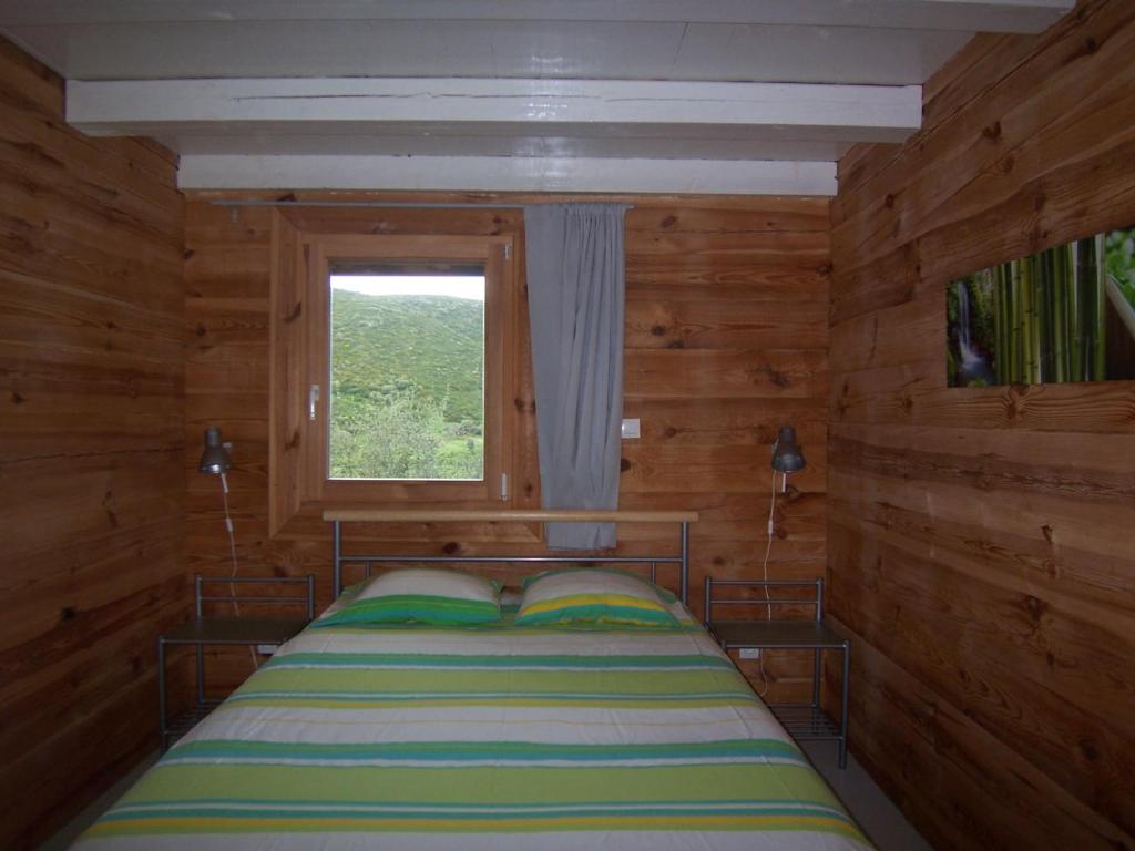 Postel nebo postele na pokoji v ubytování Albaria Lodge