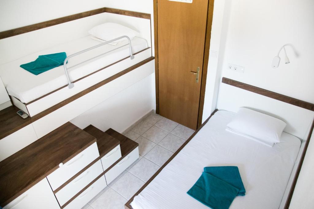 Posteľ alebo postele v izbe v ubytovaní Alexger Beach Front Deluxe house