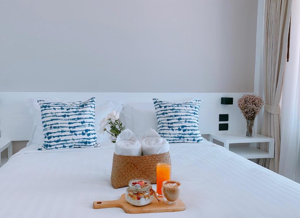 Postel nebo postele na pokoji v ubytování Blue Tao Beach Hotel - SHA Plus