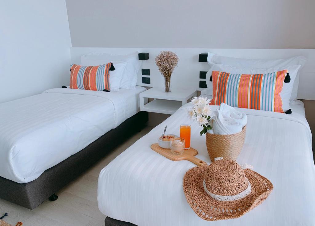 Postel nebo postele na pokoji v ubytování Blue Tao Beach Hotel - SHA Plus
