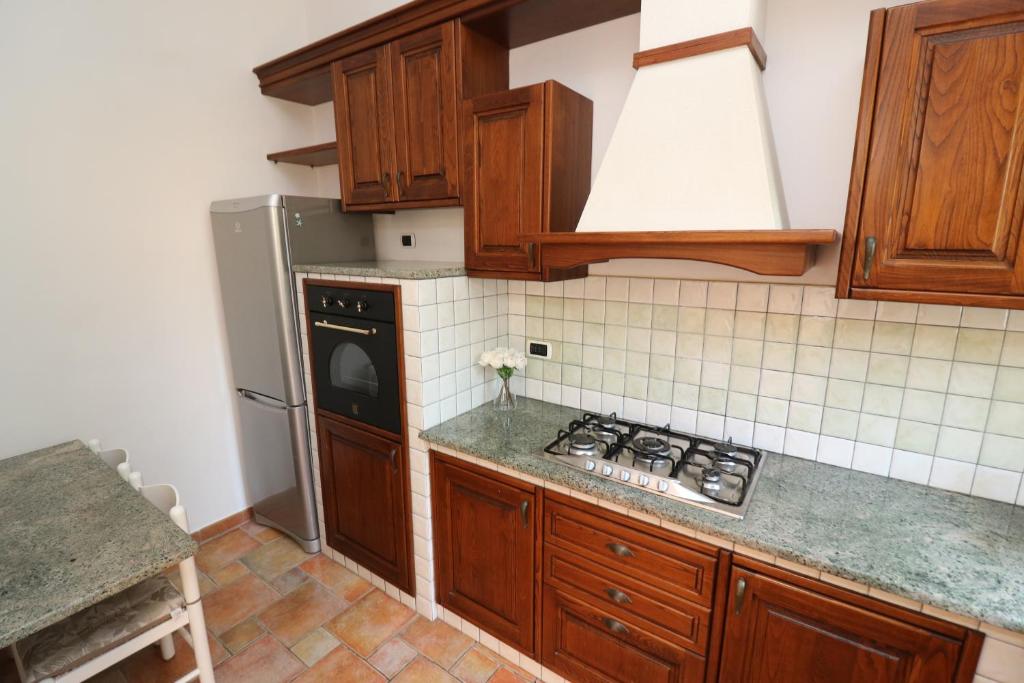 Kuchyň nebo kuchyňský kout v ubytování Baia della Serenità