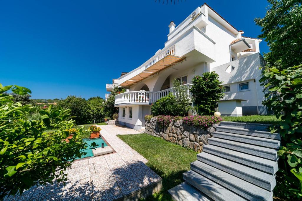 Vonkajšia záhrada v ubytovaní Guesthouse Halilagic