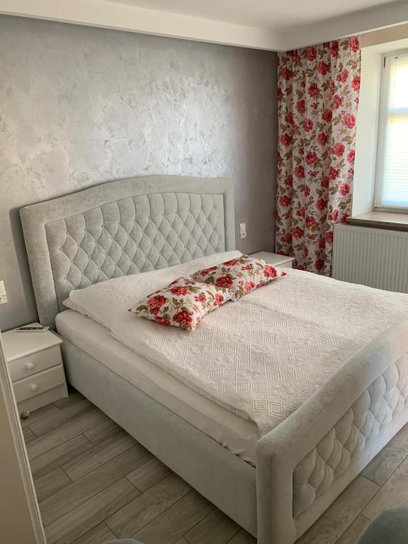 Postel nebo postele na pokoji v ubytování Villa Leon Hel