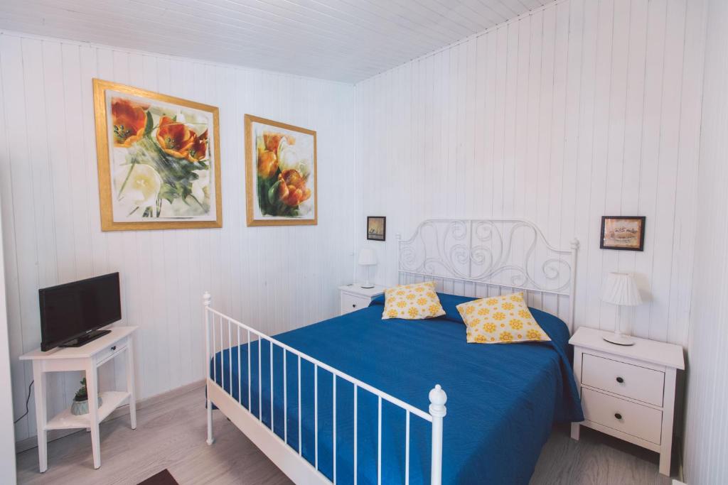 Postel nebo postele na pokoji v ubytování Hotel Como