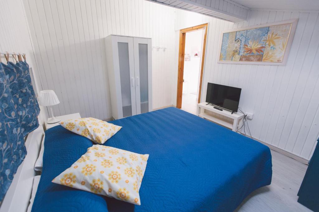 Postel nebo postele na pokoji v ubytování Hotel Como