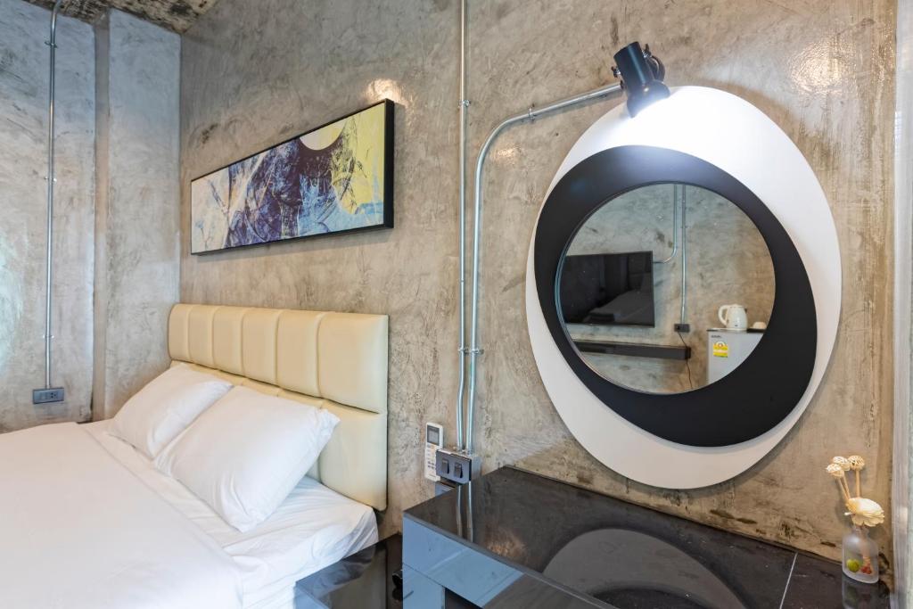 Postel nebo postele na pokoji v ubytování My Style Resort Hotel -SHA Plus