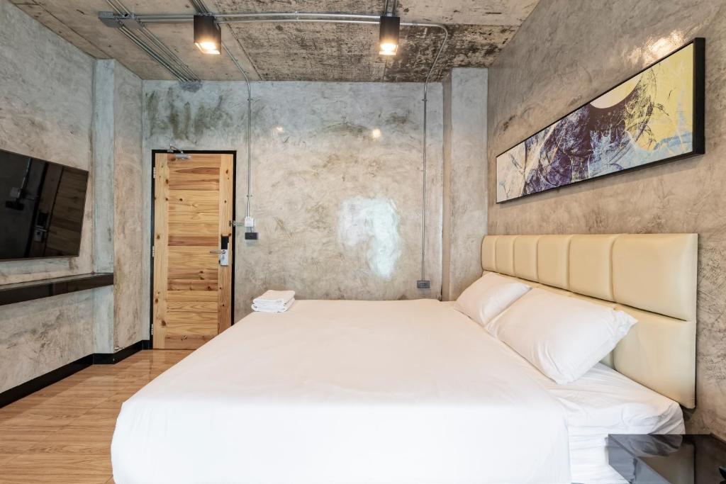 Postel nebo postele na pokoji v ubytování My Style Resort Hotel -SHA Plus