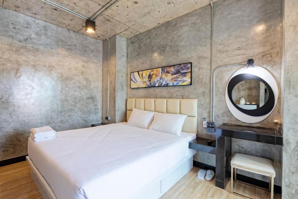 Postel nebo postele na pokoji v ubytování My Style Resort Hotel -SHA Plus