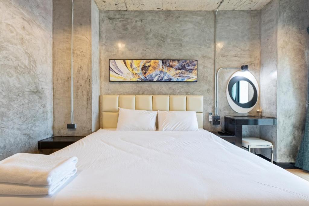 Postel nebo postele na pokoji v ubytování My Style Resort Hotel -SHA Plus