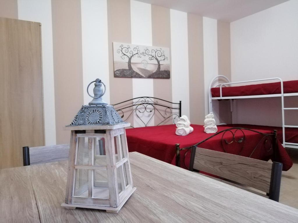 Postel nebo postele na pokoji v ubytování Lu Marchese