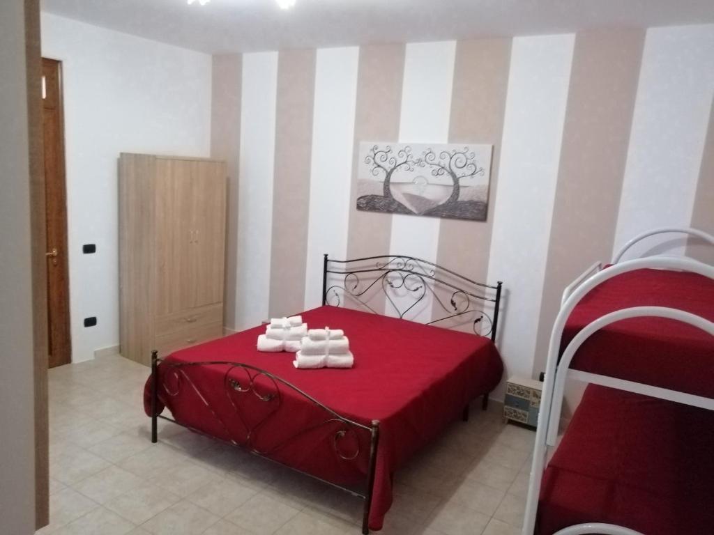 Postel nebo postele na pokoji v ubytování Lu Marchese