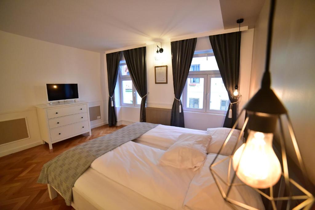 Llit o llits en una habitació de Maison Blanche