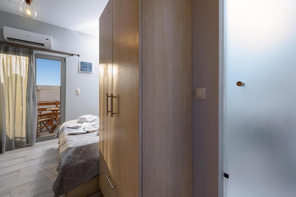 Postel nebo postele na pokoji v ubytování Ageliki Studio