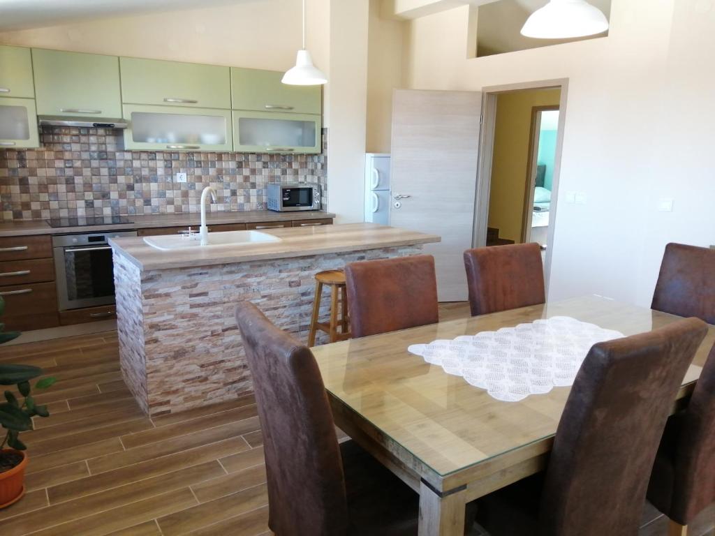 Kuchyň nebo kuchyňský kout v ubytování Apartmani Vinka