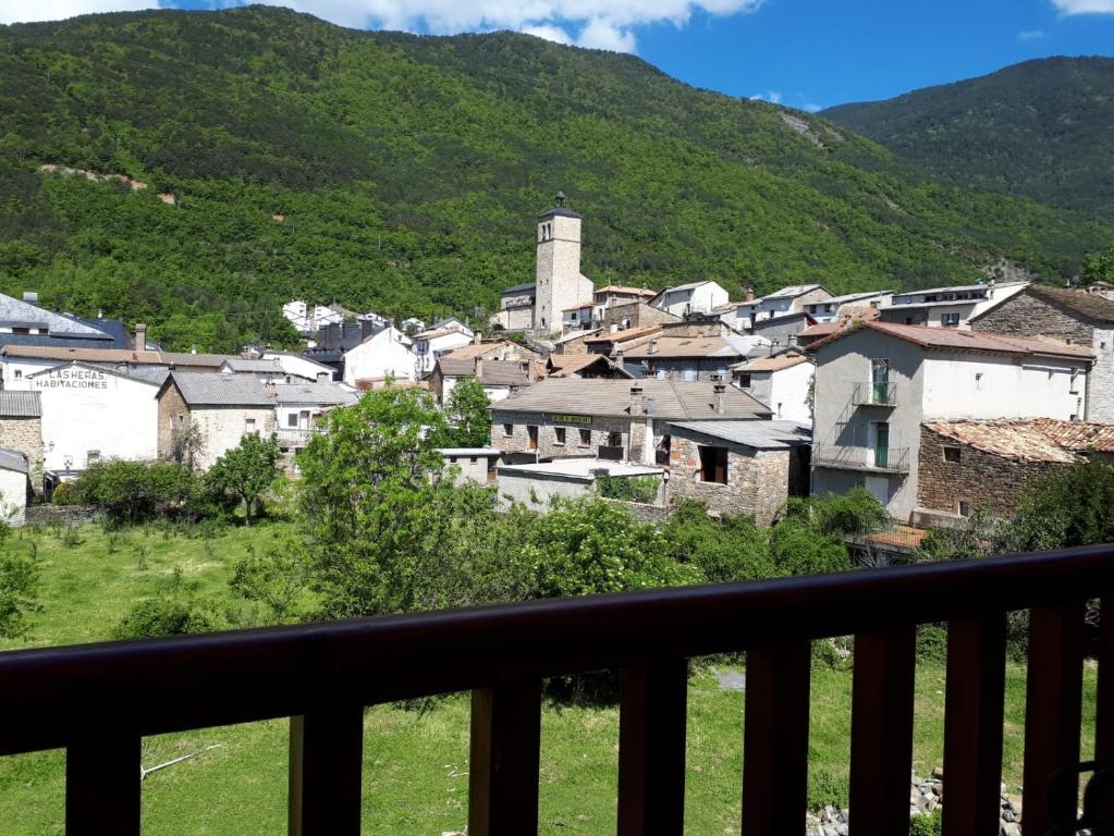a view of a town from a balcony at Biescas San Roque in Biescas