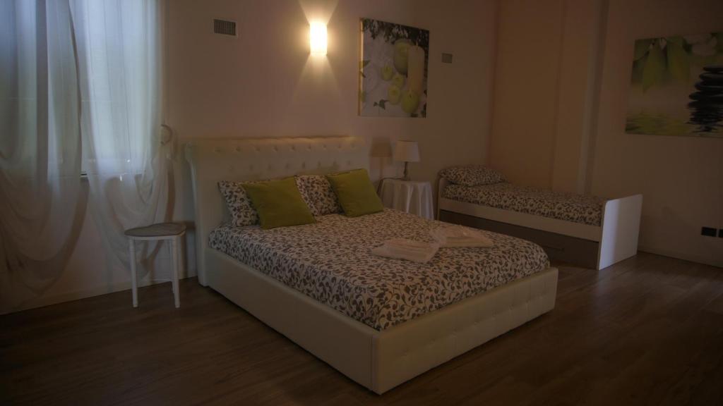 Postel nebo postele na pokoji v ubytování B&B CORTE SANT'ANGELO
