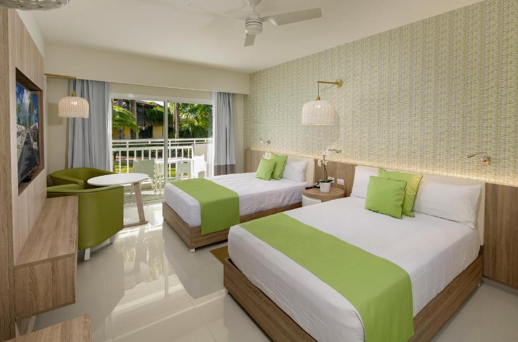 Postel nebo postele na pokoji v ubytování Grand Sirenis Punta Cana Resort & Aquagames - All Inclusive