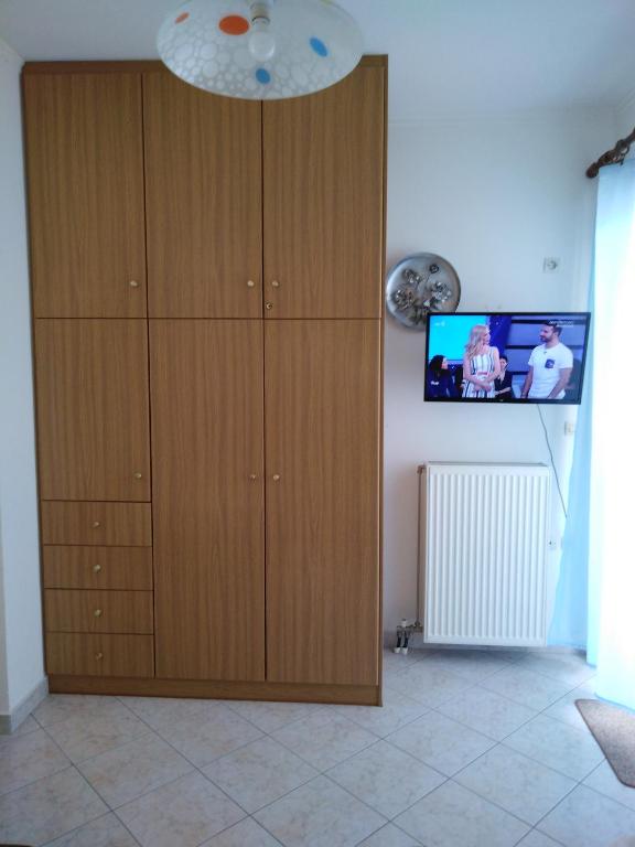 TV a/nebo společenská místnost v ubytování NEW PANORAMA STUDIOS ELECTRIC car ΦΟΡΤΙΣΗΣ ΣΤΑΤΙΟΝ