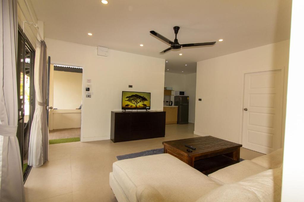 Postel nebo postele na pokoji v ubytování Aussieland Bungalows