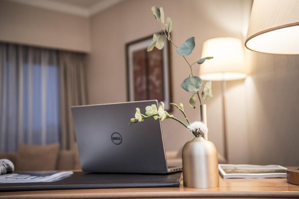 TV a/nebo společenská místnost v ubytování Xiyuan Hotel