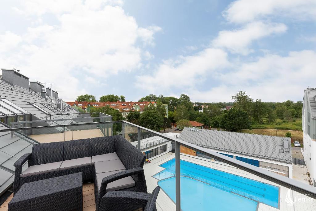 Bazén v ubytovaní Feniks SPA Apartments 10 by Jantar Apartamenty Kołobrzeg alebo v jeho blízkosti