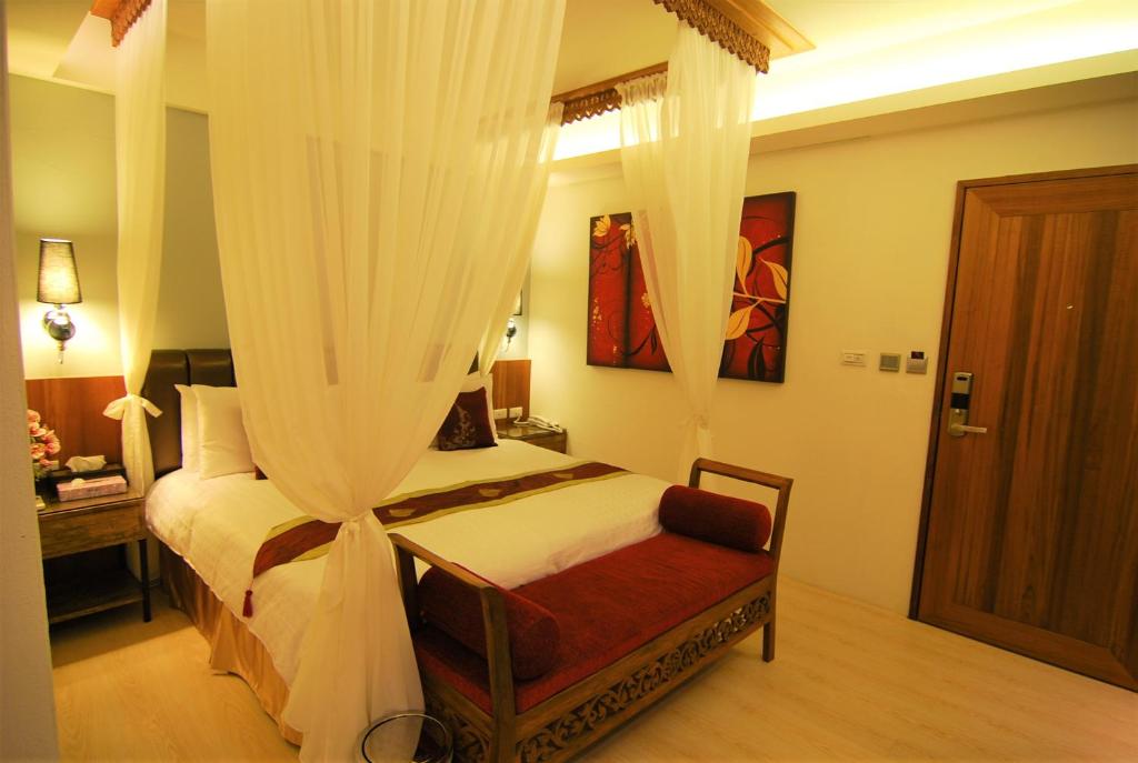 Voodi või voodid majutusasutuse A&L Inn 戀灣旅棧 toas