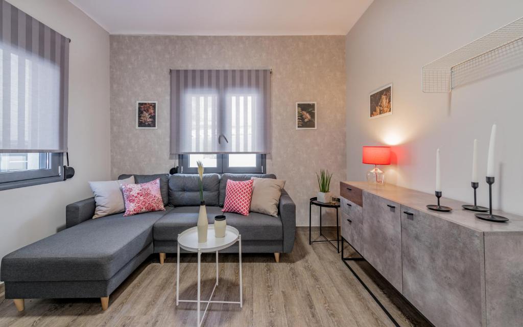 Posedenie v ubytovaní Cosy apartment in the heart of the city centre