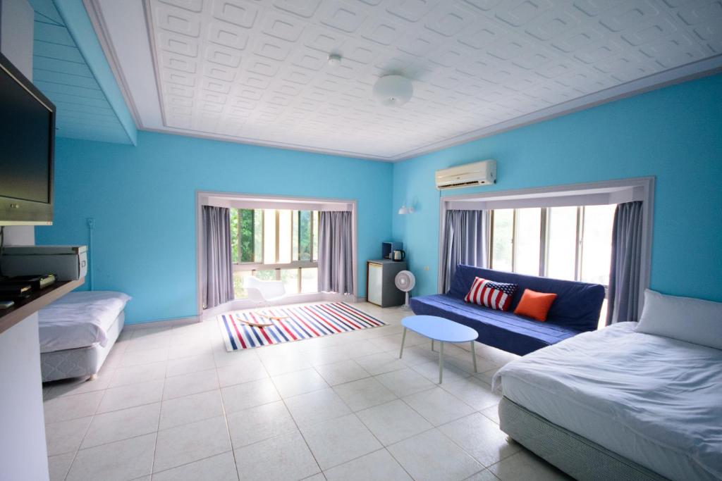Postel nebo postele na pokoji v ubytování Green 58 B&B
