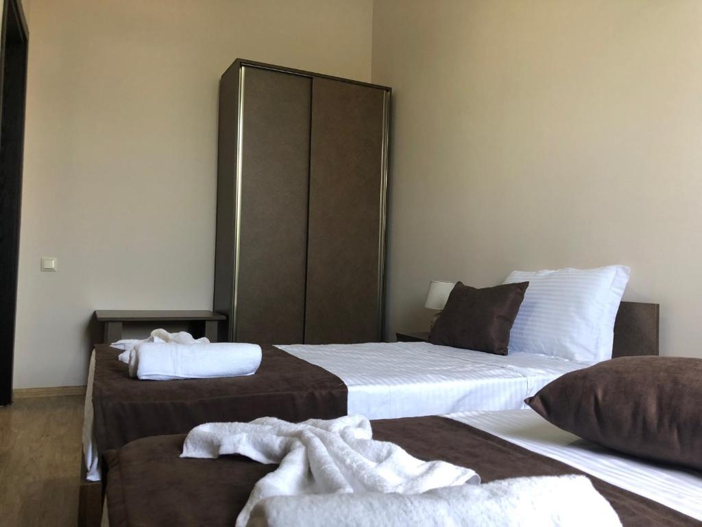 Postel nebo postele na pokoji v ubytování Guesthouse Family
