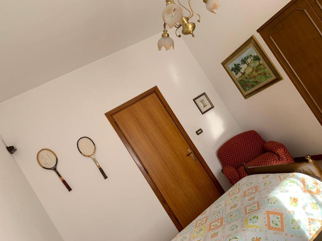 Letto o letti in una camera di Casa vacanza in Salento
