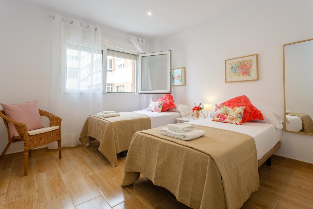 Posteľ alebo postele v izbe v ubytovaní Casa Ros-PLAYA free parking by Cadiz4Rentals
