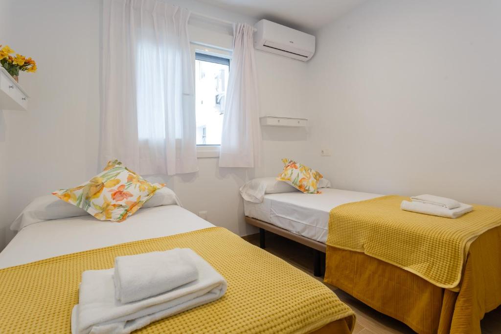 Posteľ alebo postele v izbe v ubytovaní Casa Ros-PLAYA free parking by Cadiz4Rentals