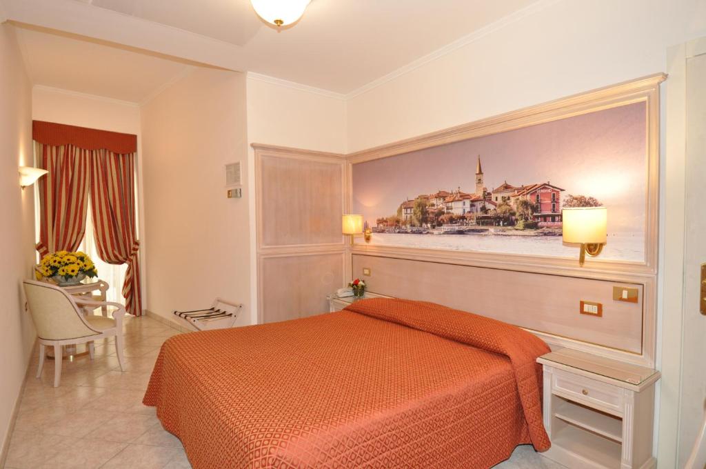 Posteľ alebo postele v izbe v ubytovaní Hotel Moderno - Cavour 30tre