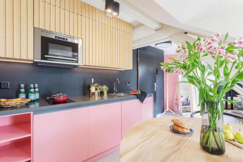 Kuchyň nebo kuchyňský kout v ubytování VISIONAPARTMENTS Cramerstrasse 2-6 - contactless check-in
