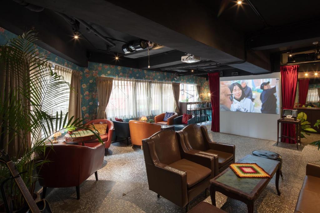 TV a/nebo společenská místnost v ubytování Cho Hotel