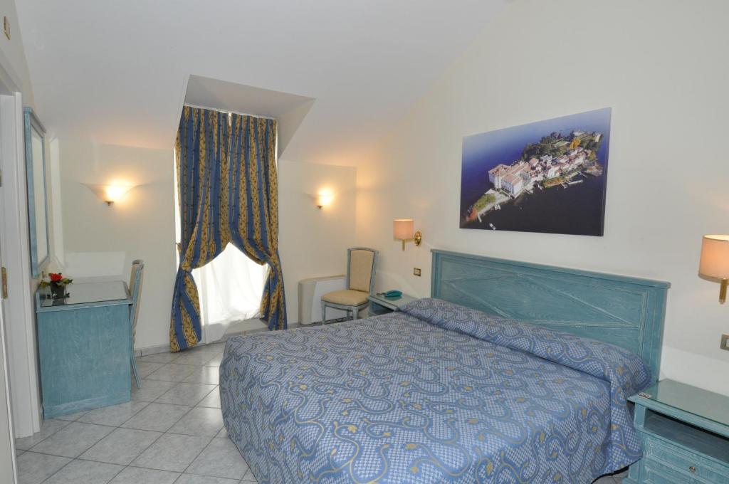 Posteľ alebo postele v izbe v ubytovaní Hotel Moderno - Cavour 30tre