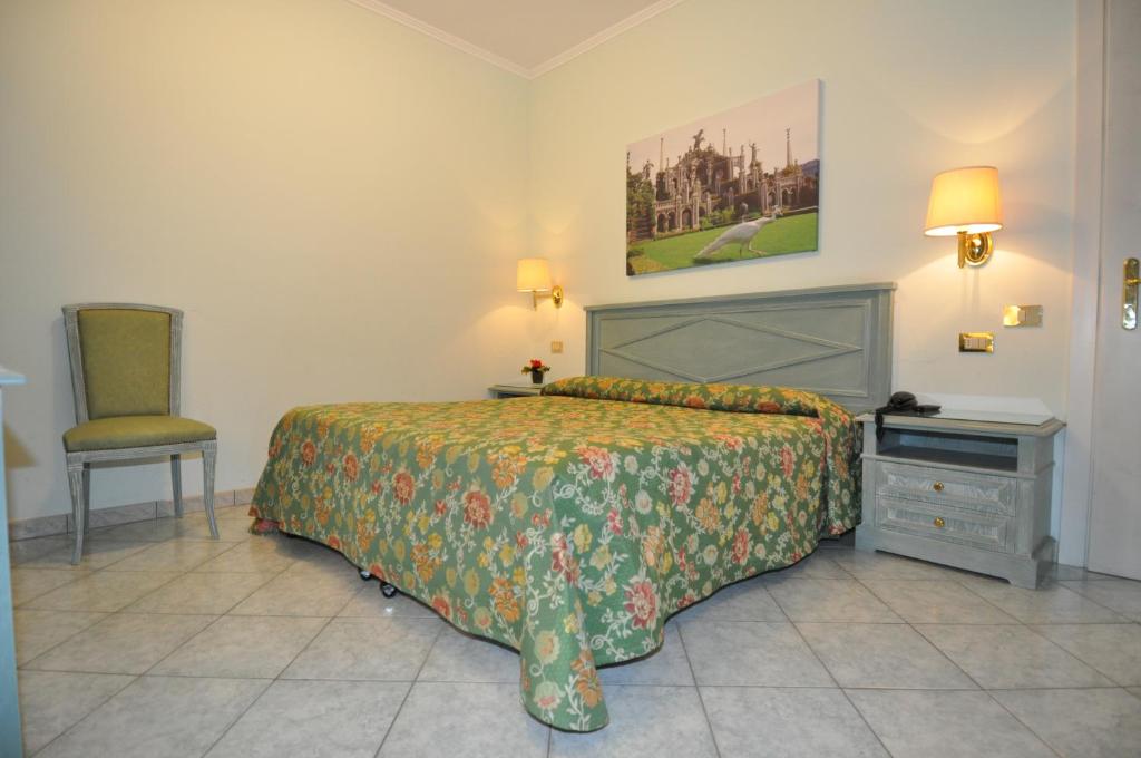 Posteľ alebo postele v izbe v ubytovaní Hotel Moderno - Cavour 30tre