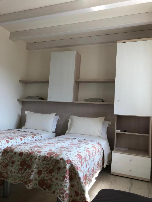Postel nebo postele na pokoji v ubytování B&B Isola Verde