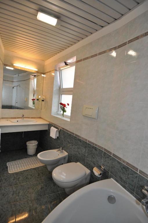 Kúpeľňa v ubytovaní Hotel Moderno - Cavour 30tre
