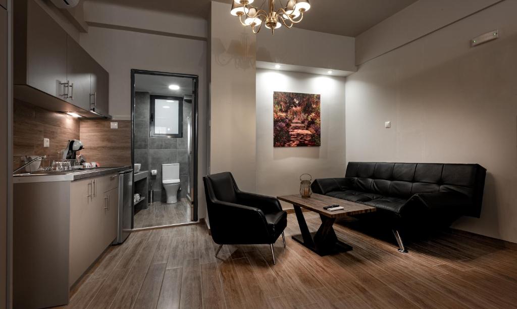Kuchyň nebo kuchyňský kout v ubytování Pallada Athens boutique rooms & apartments