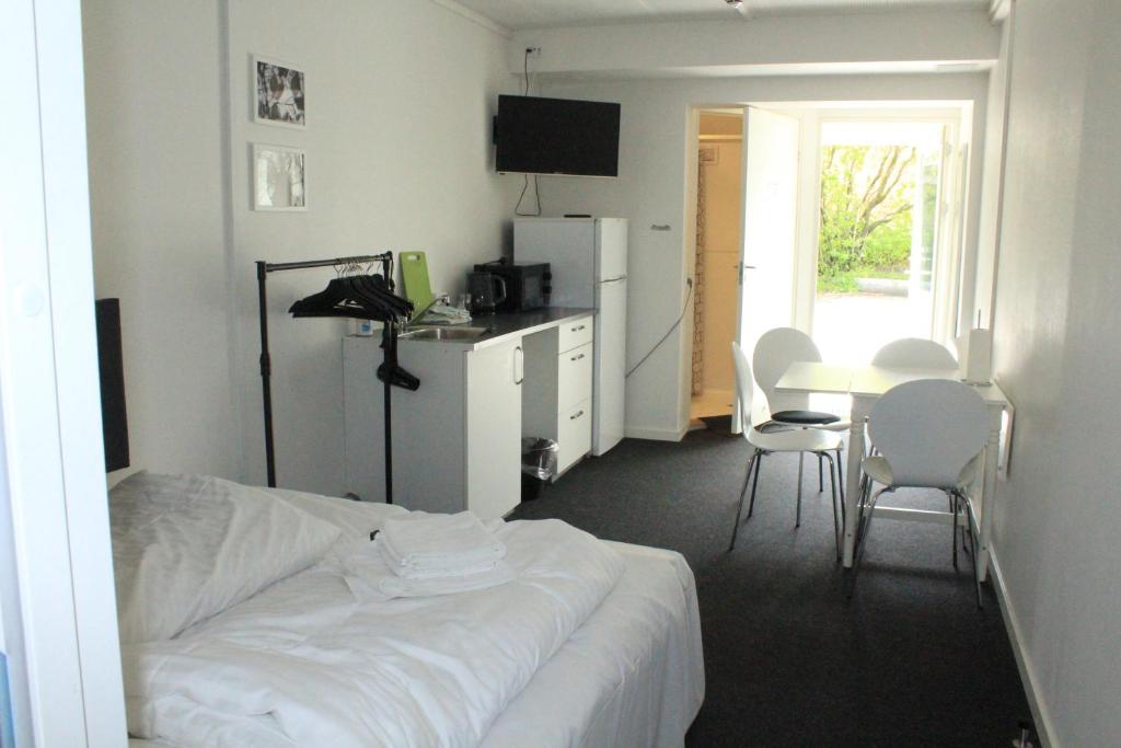 Postel nebo postele na pokoji v ubytování Motel Poppelvej