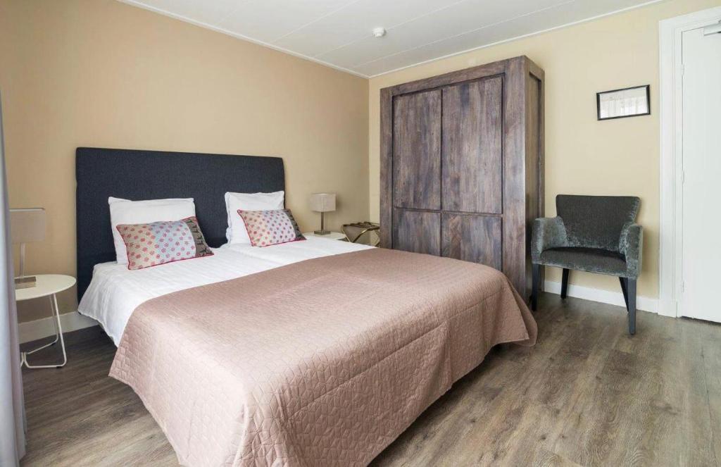 Postel nebo postele na pokoji v ubytování Hotel Loco