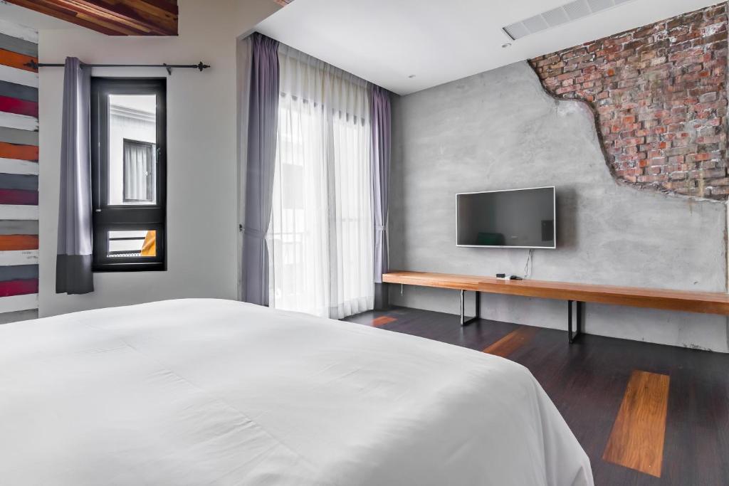 TV a/nebo společenská místnost v ubytování Warehouse Inn