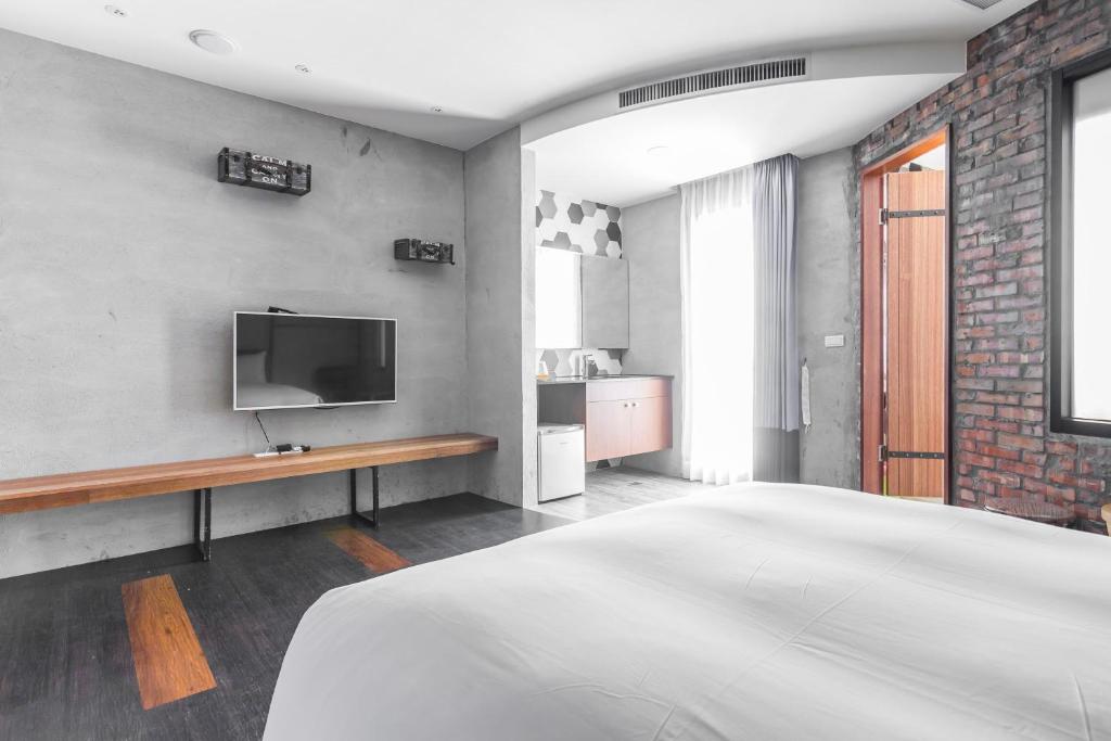 TV a/nebo společenská místnost v ubytování Warehouse Inn